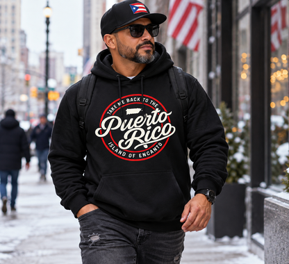 Man wearing the black Take Me Back to Puerto Rico Island of Encanto hoodie on a winter city street