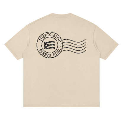 Back print of the distressed Puerto Rican flag stamp tee in Gray Apricot.